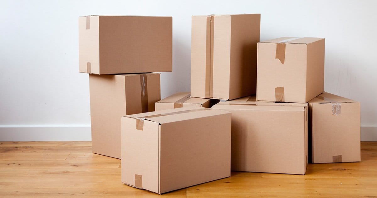 Neatly packed and organized moving boxes showcasing expert packing techniques for a smooth relocation.